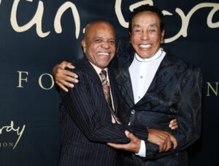 Music Legends Berry Gordy and Smokey Robinson Announced as 2023 MusiCares Persons of the Year Creating music brought these two legends together, and now the best friends will experience a prestigious honor together as well. The Recording Academy’s philanthropic partner announced on Thursday, October 20, that Motown Records founder Berry Gordy and legendary musician Smokey Robinson will be honored as the 2023 MusiCares persons of the year. We are excited to announce that Berry Gordy and @SmokeyRobinson are the honorees of the 2023 @MusiCares #PersonsoftheYear benefit gala! Proceeds from the Official GRAMMY Week Event will provide essential support for #MusiCares . Photos by © Jenny Risher and @SmokeyRobinson . pic.twitter.com/nXWkCiulbJ — MusiCares (@MusiCares) October 20, 2022 “Wow! How honored I am to be named the MusiCares Persons of the Year, and together with my best friend of over 65 years, the great Smokey Robinson. How special is that!” Gordy said in a press statement. “I am grateful to be included in MusiCares’ remarkable history of music icons. The work they do is so critical to the well-being of our music community, and I look forward to a most exciting evening.” According to Billboard , the Person of the Year gala, which is set to take place two nights prior to the the 65th annual Grammy Awards, is one of the most prestigious events held during Grammy Week. “I am honored that they have chosen me and my best friend and Motown founder Berry Gordy to share this beautiful honor and celebrate with you all together,” Robinson said, while acknowledging the work MusiCares has done for the creative community. Robinson shared that he has been a supporter of... Written by Stacy Jackson | Shared from Black Enterprise @blackenterprise See more at SWATS.com #SWATS #Entertainment #Music #MusicIndustry #MusicBusiness #Artist #Musicproduction #AecordingArtist #RecordingStudio #Musiclove #Singer #MusicPromotion #Musiclover #MusicStudio #Trending #Media #BlackCulture #Melanin #Afrocentric #ProBlack #Culture #Grammys